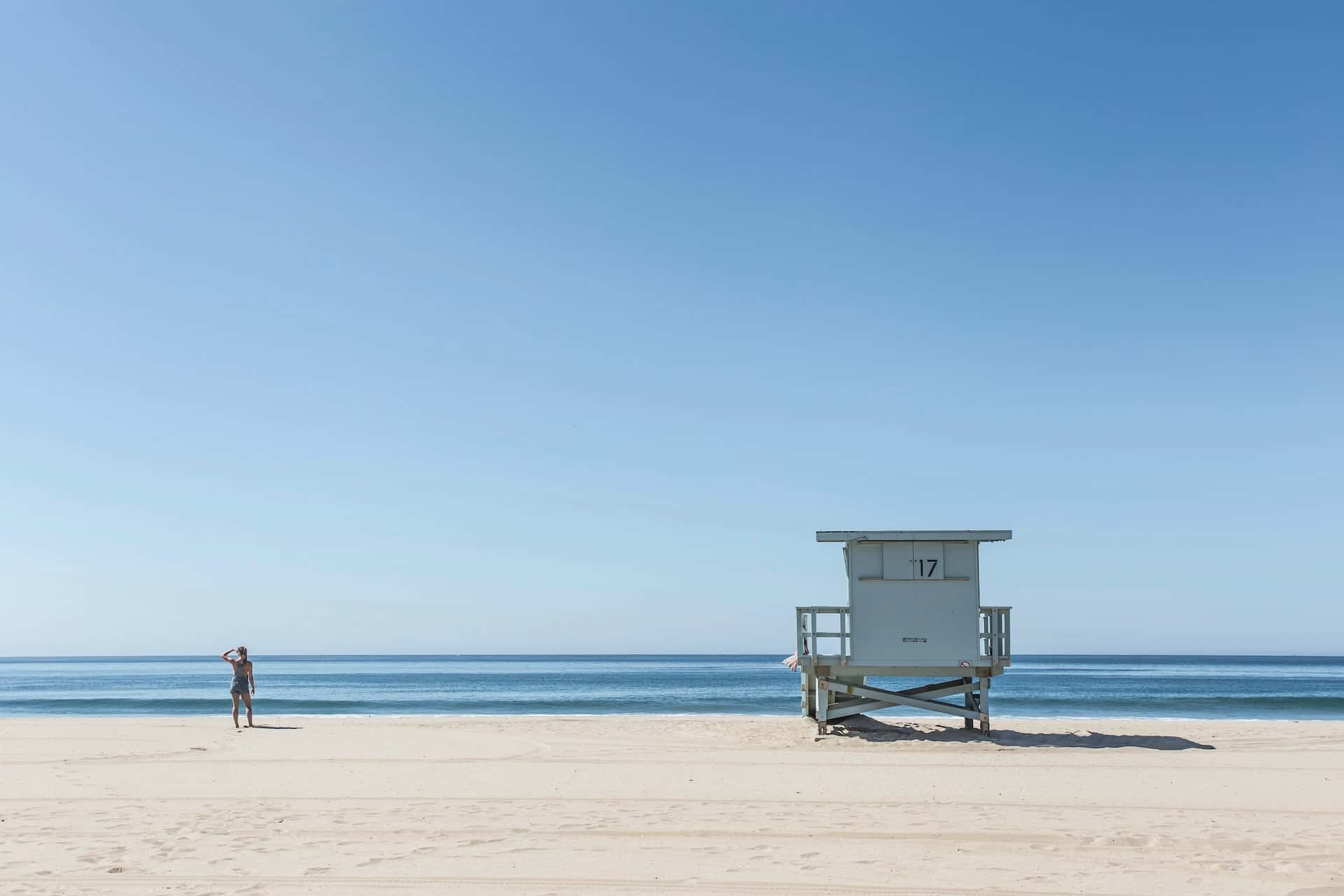 person standing on the beach