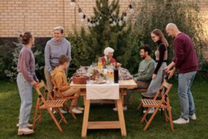 Family having picnic on terrace for Mother's day gift